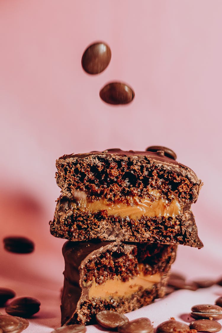 Coffee Beans Flying Over Chocolate Cake