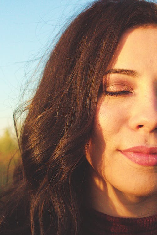 Free Close-up Photo of Woman Closing Her Eyes Stock Photo