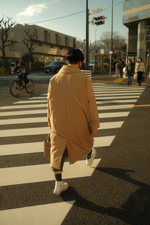 A Person Crossing the Street