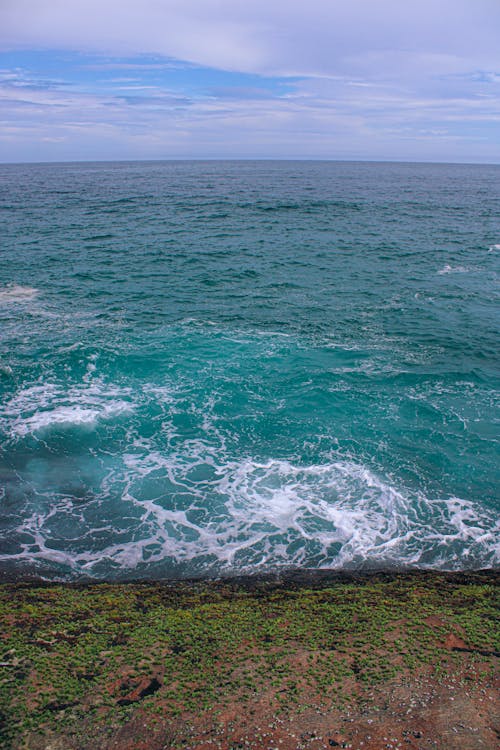 Turquoise Sea Water Hitting Shore
