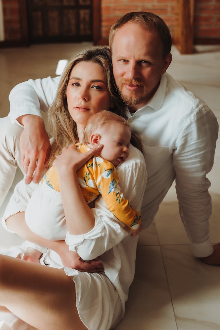 Portrait Of A Couple With A Baby