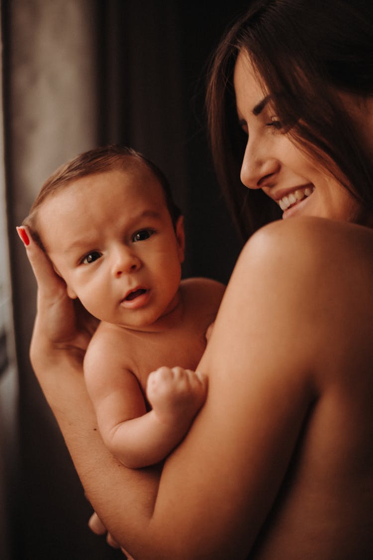 Portrait Of A Woman With A Baby