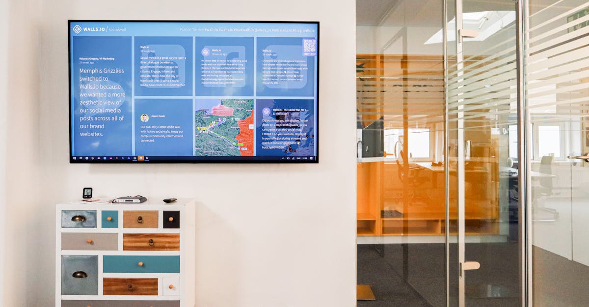 Interior of a Modern Office with a Flat TV Screen on a Wall Displaying ...