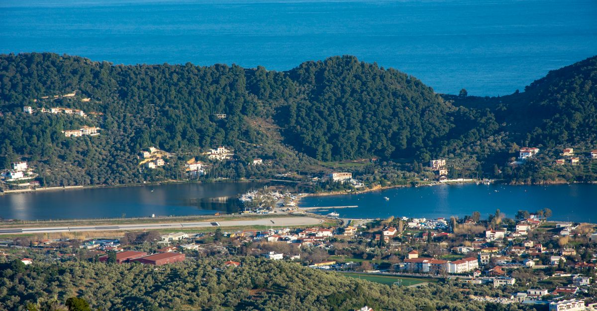 Wooded coastline and calm water off Skiathos, Thessaly
