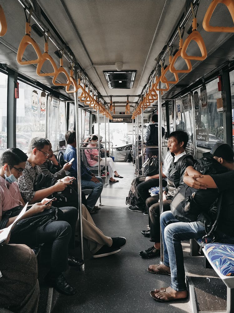 People Sitting Inside The Train