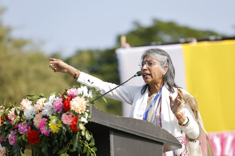 Woman Speaking From A Pulpit 