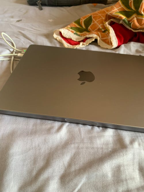 MacBook Pro 14' on Bed Aesthetic look