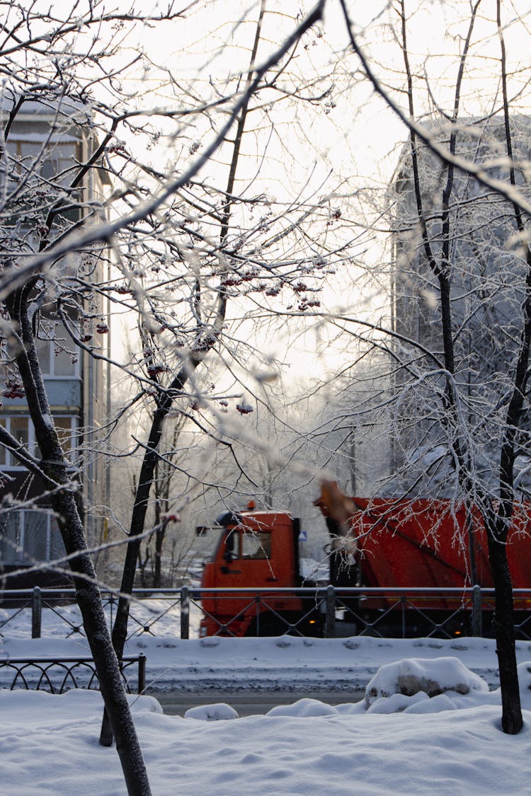 Truck Running In Winter City