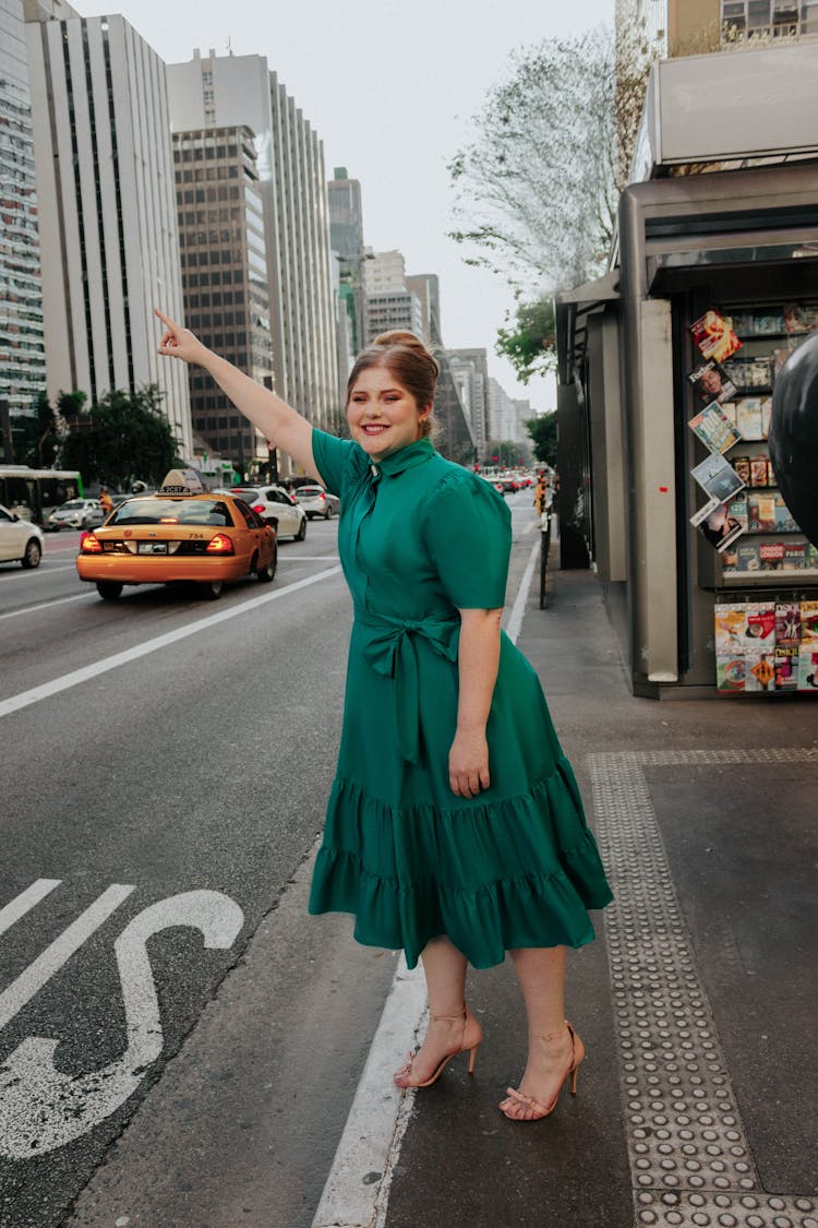 Woman Catching A Taxi 