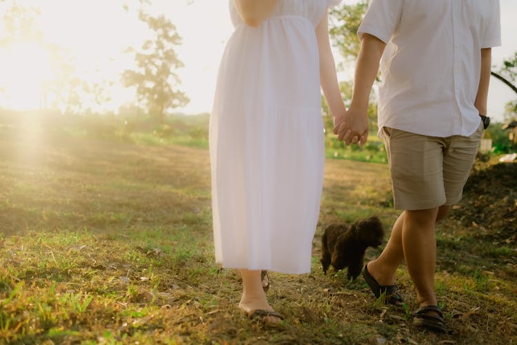 Couple Walking With Holding Hands