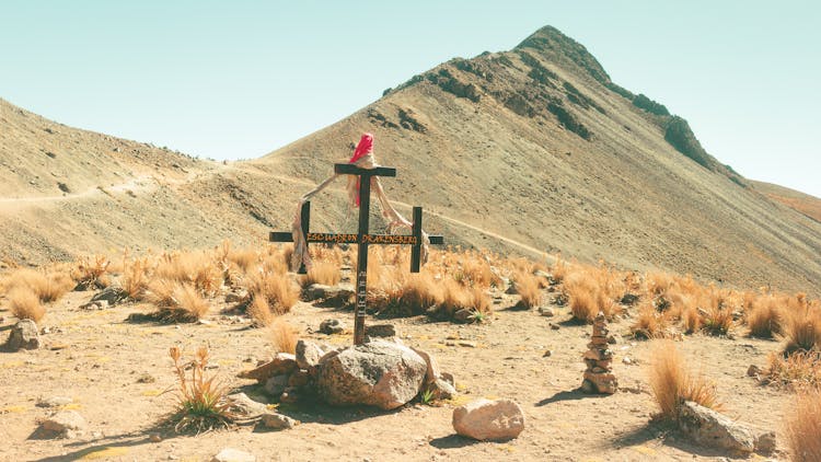 Cross And Arid Hill Behind