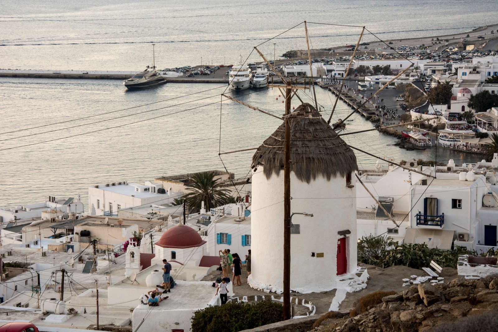 Mykonos windmills Little Venice harbour sunset boats