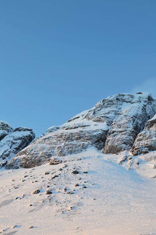 Foto stok gratis dingin, formasi batuan, gunung berselimut salju