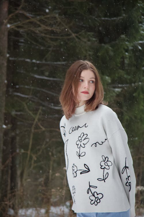 Brunette Woman Posing in Winter Forest
