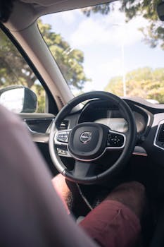 Experience the Volvo XC90 interior from the driver's perspective on a sunny day.