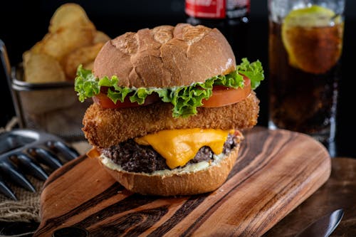 Free Close-up of Delicious Hamburger on Board Stock Photo