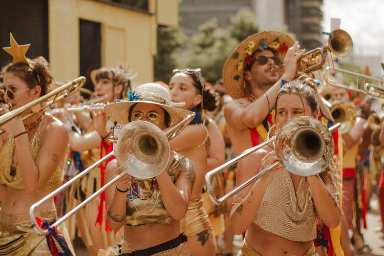 People With Musical Instruments On Street Festival