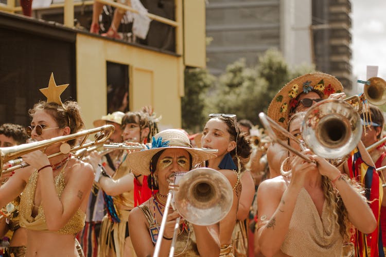 People With Musical Instruments On Street Festival