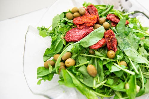 Spinach Salad with Olives and Roasted Tomatoes