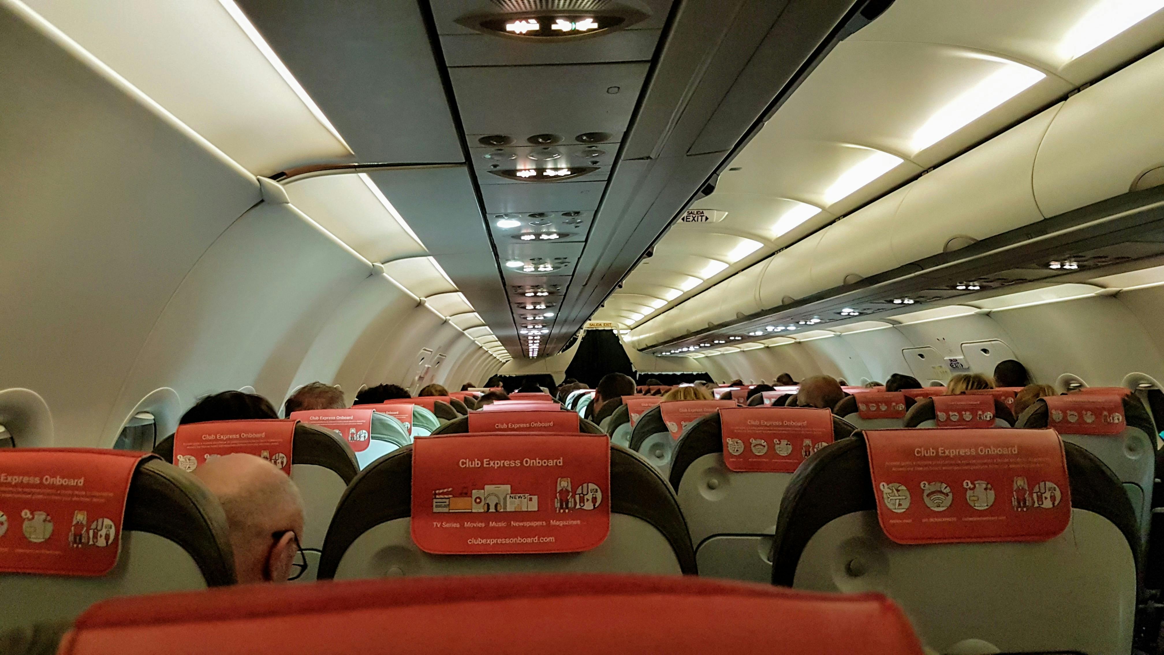 Interior Of Airplane With Passengers Free Stock Photo   Pexels Photo 1547739 