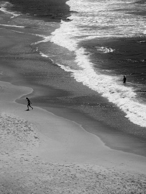 Grayscale Photo of Bondi Beach