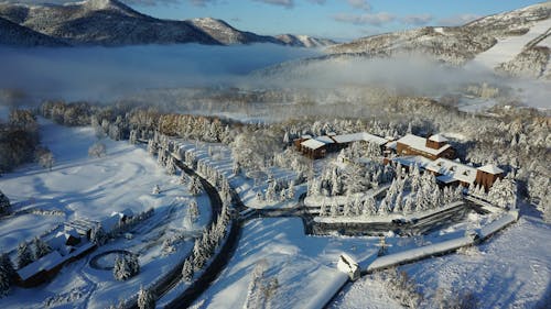 Aerial Photography Of Buildings Covered By Snow