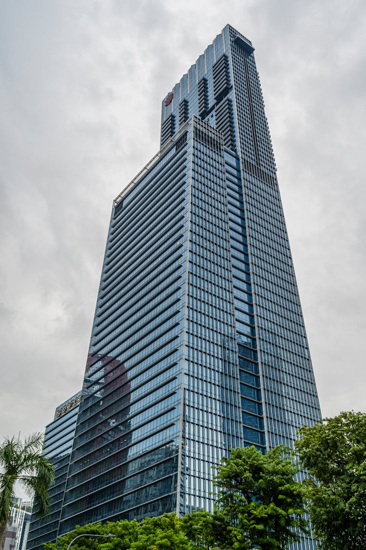 Glass Modern Building On Blue Sky