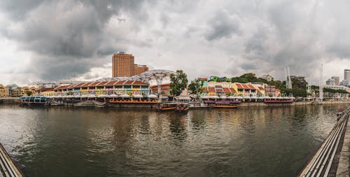 강가, 고층 건물, 도시의 무료 스톡 사진