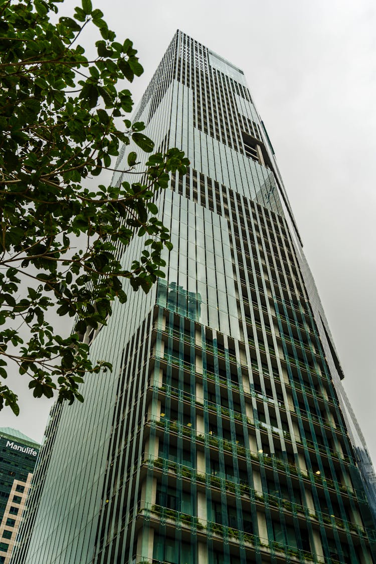 Modern Glass Building On Sky Background