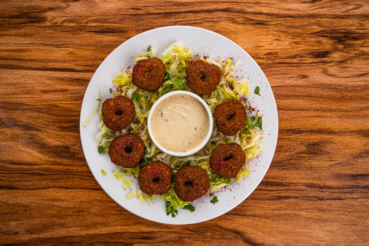 Photo Of Falafel Balls Served On A Salad