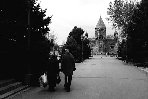 A Couple Walking on the Street