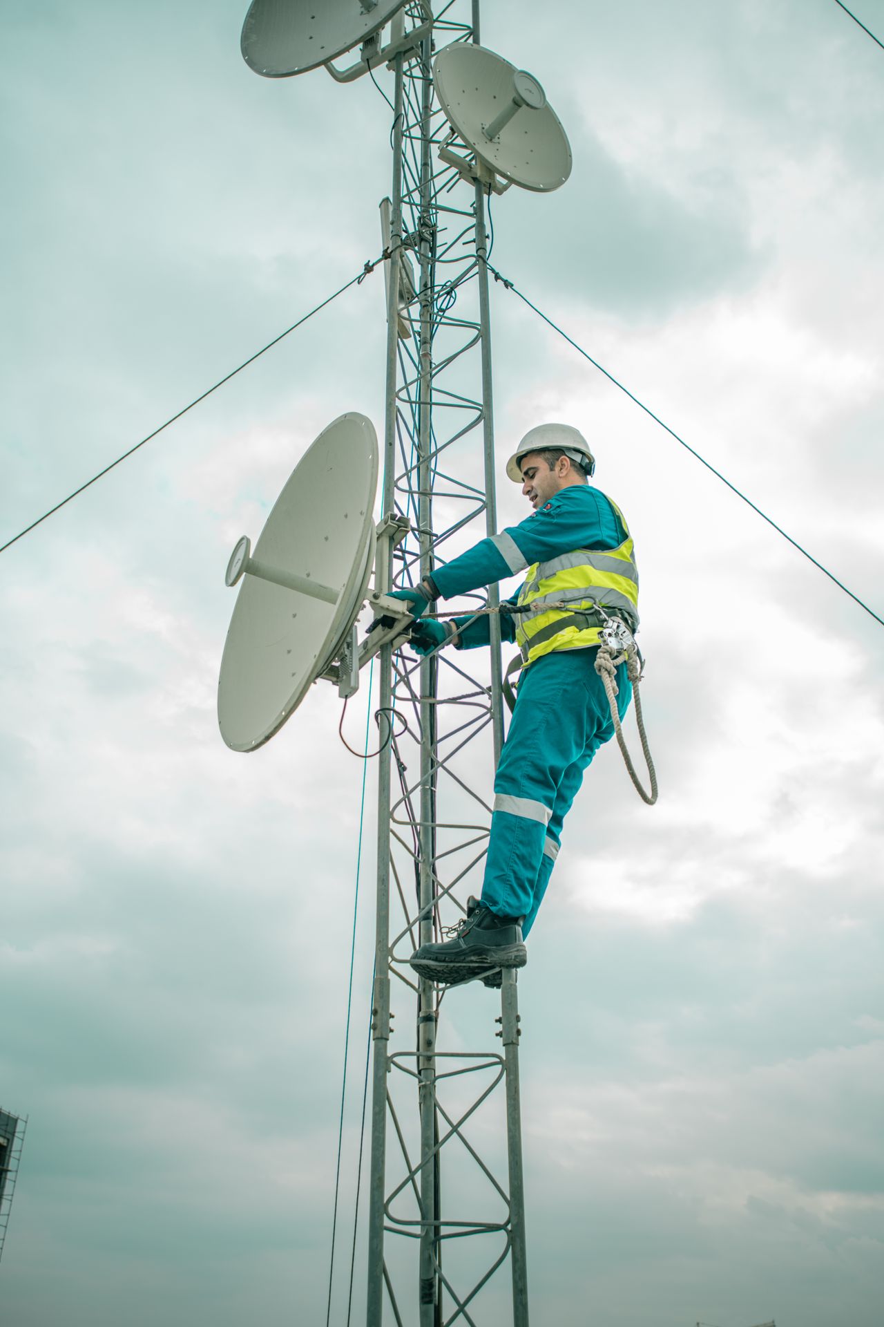 Engineer installing telecommunication infrastructure