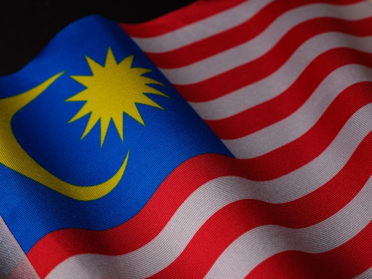 A Close-Up Shot Of The Flag Of Malaysia