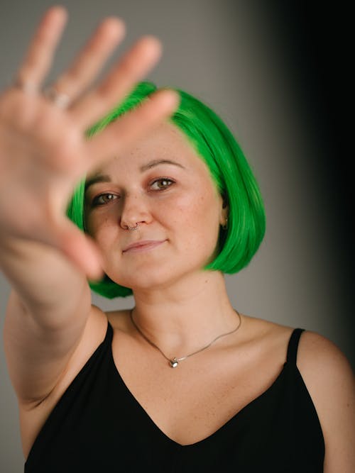 Free Young Woman with Bright Green Hair  Stock Photo