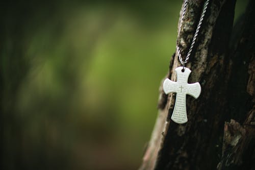 Close-up of a Necklace with a Cross