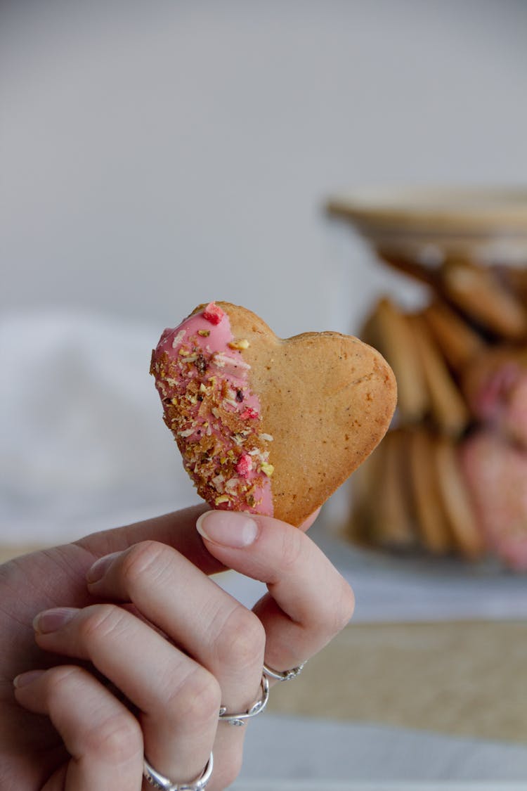 Hand Holding A Cookie 