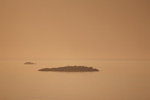 Immagine gratuita di alba, isolotto, mare