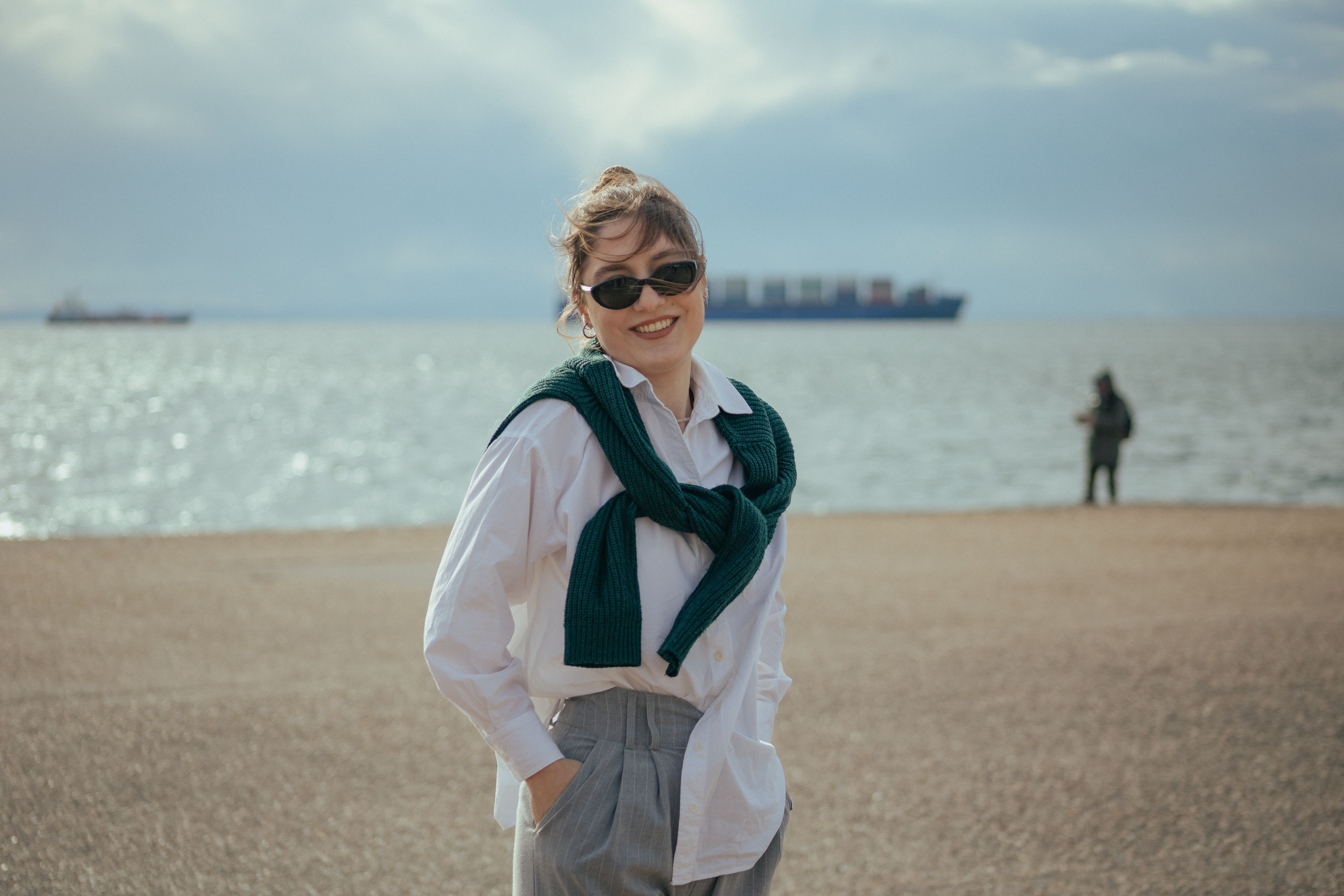 Portrait of a Woman Standing on a Beach · Free Stock Photo