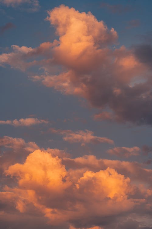 Orange Clouds in the Blue Sky