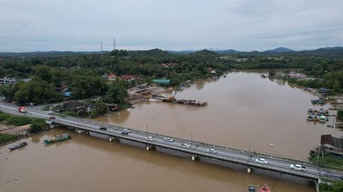 Free Scenic aerial view of a bridge over a river in Marang, Terengganu, Malaysia. Stock Photo