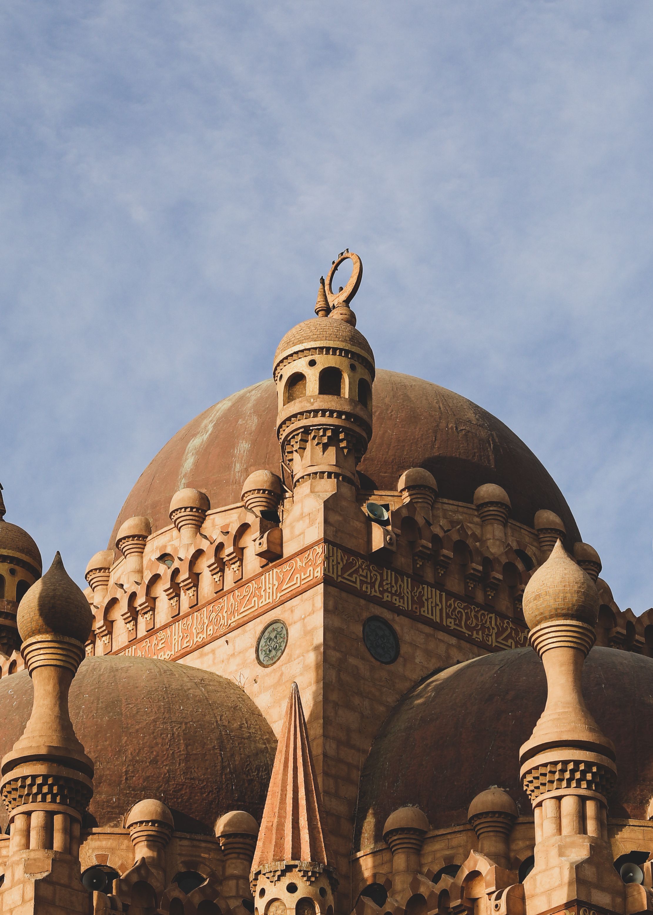 Stunning low angle view of Al Mustafa Mosque's intricate dome, showcasing Islamic architecture in Sharm El-Sheikh, Egypt.