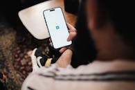 Man Using his Smartphone