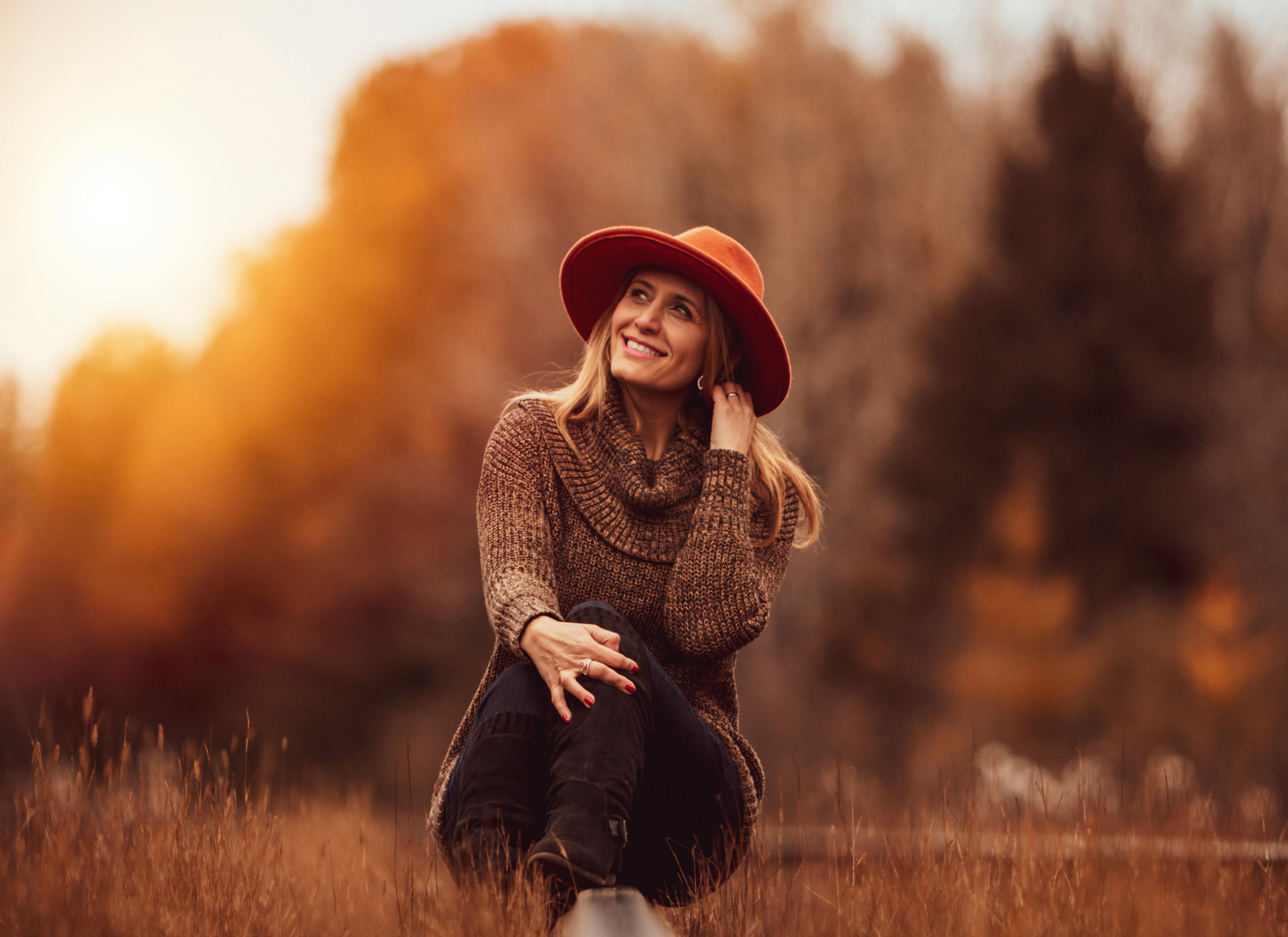 Woman Wearing Brown Sweater · Free Stock Photo