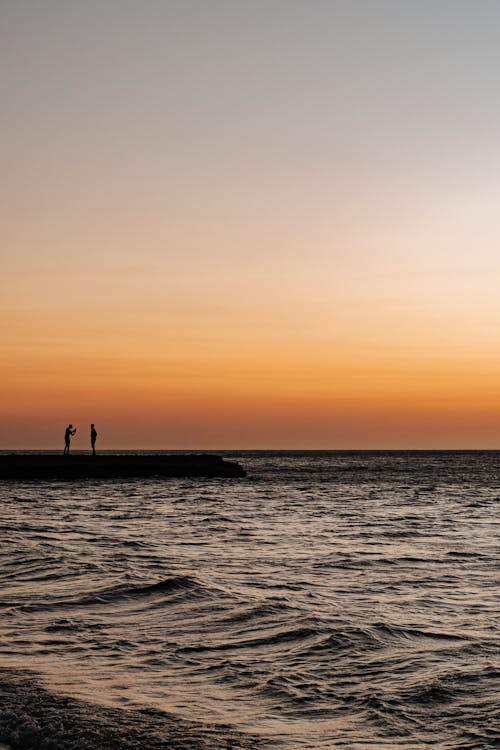 Foto profissional grátis de alvorecer, cais, mar