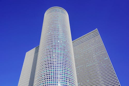 Modern skyscrapers on a background of blue sky, view from the bottom up