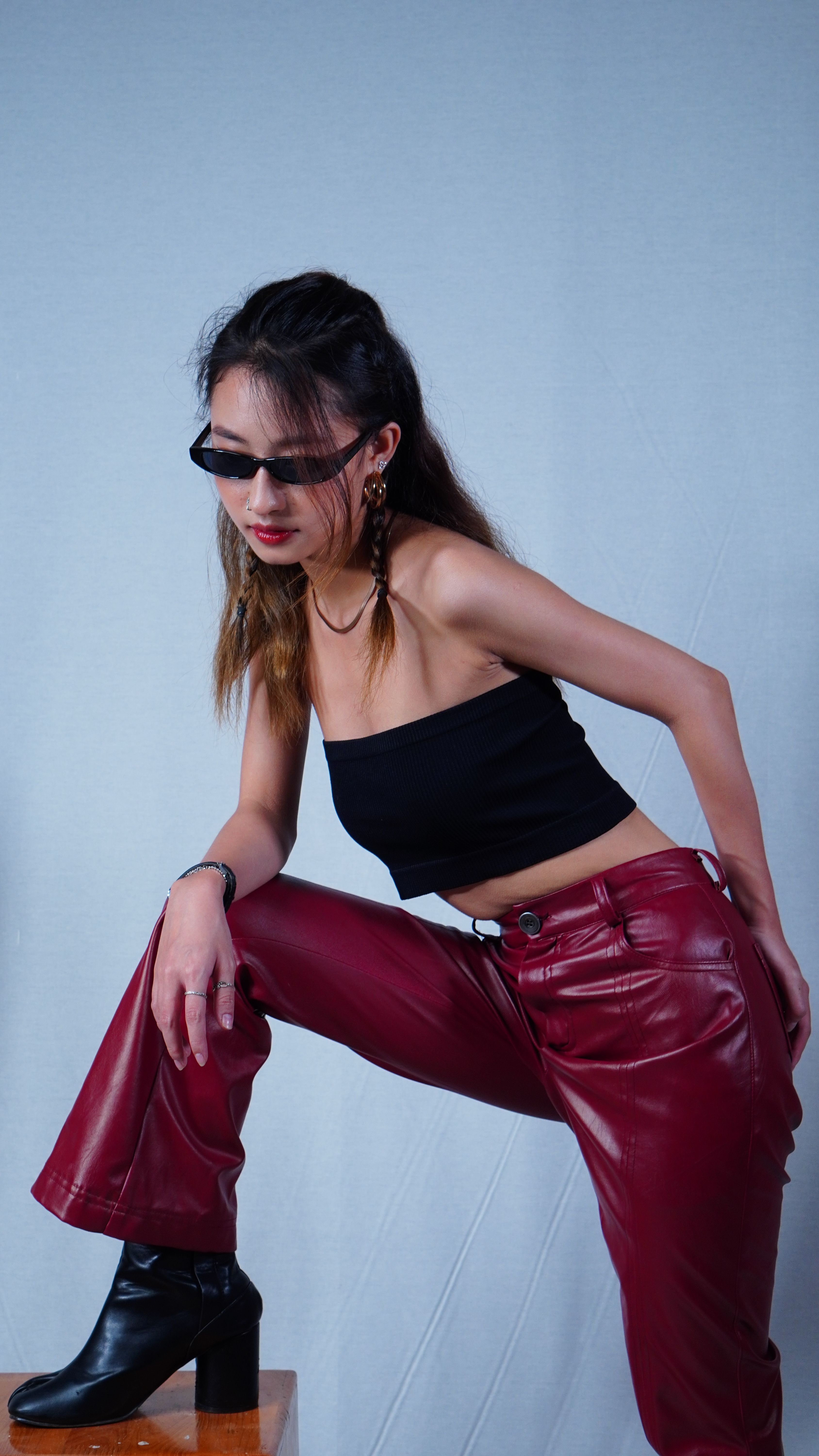 Woman in a Black Crop Top and Leather Pants · Free Stock Photo