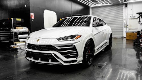 White Lamborghini Urus in Garage