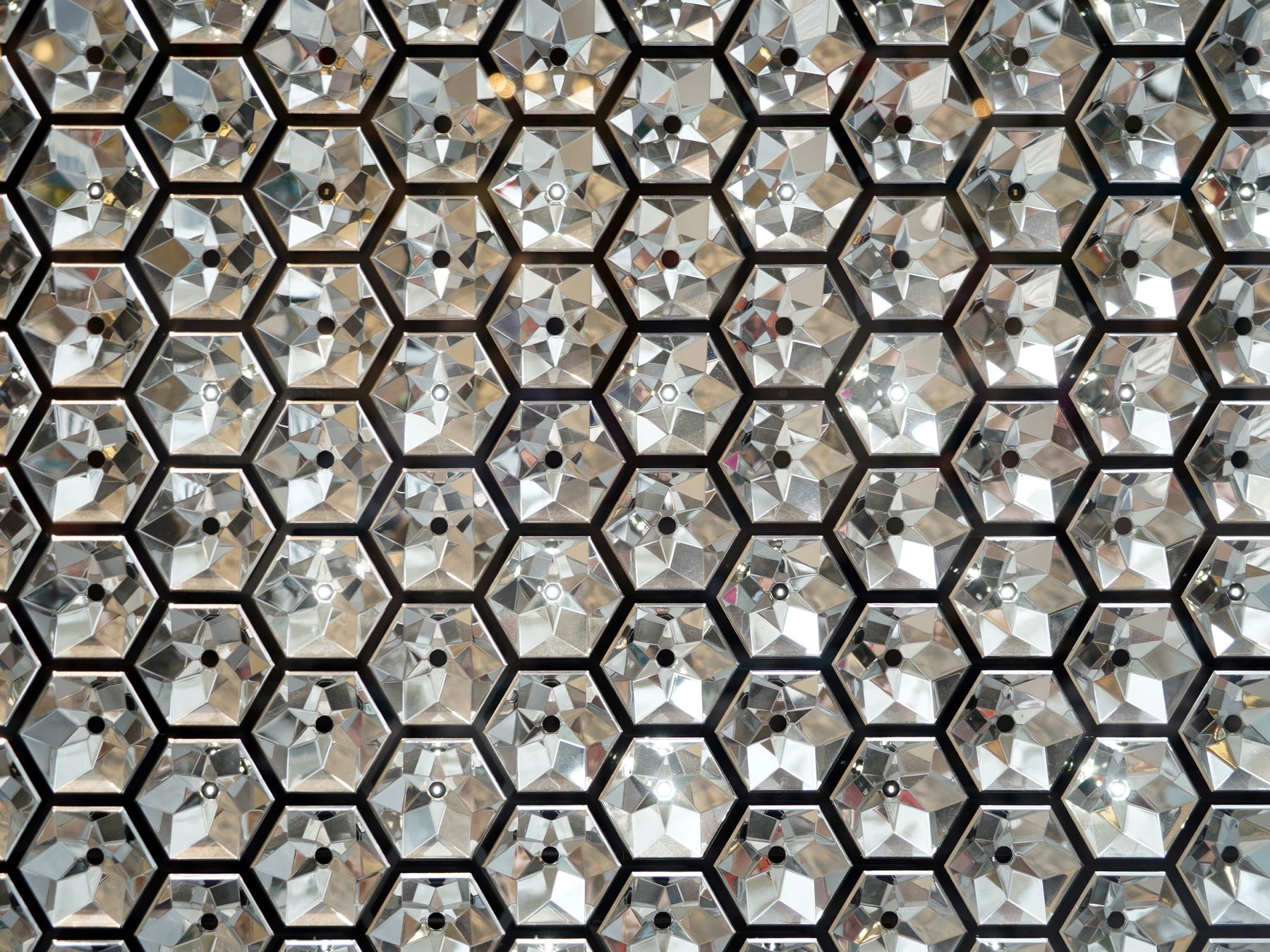 Wallpapering in Crystal Palace — clean edges cut in around trim and sockets