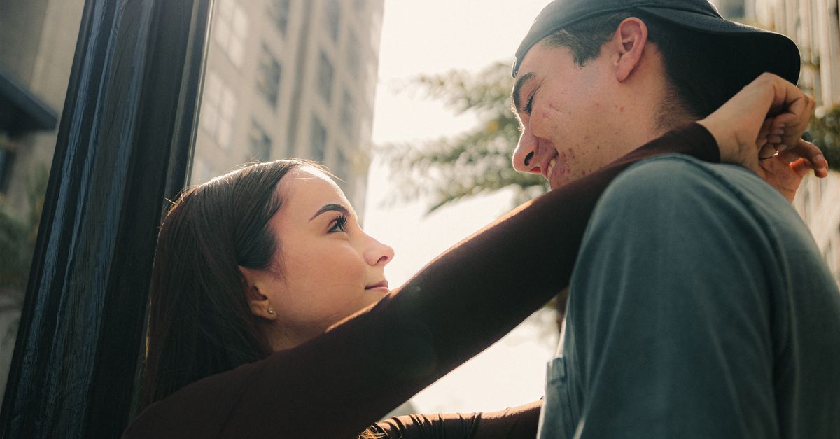 Sunlight over Hugging Couple · Free Stock Photo