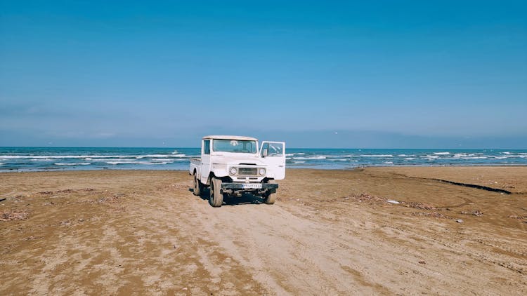 A Car On A Beach 